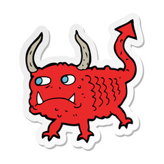 sticker of a cartoon little demon