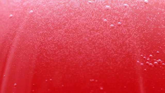 Soda Bubbles On Red Background