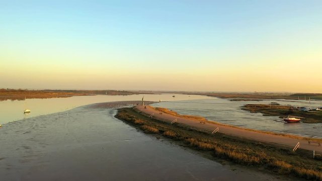 Aerial sequence tracking the River Chelmer near Maldon in Essex and featuring the Statue of Byrhtnoth who was Ealdorman of Essex and died 11 August 991 at the Battle of Maldon. 