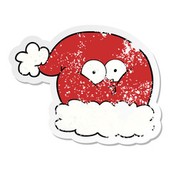 distressed sticker of a cartoon christmas santa hat