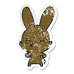 distressed sticker of a curious bunny cartoon