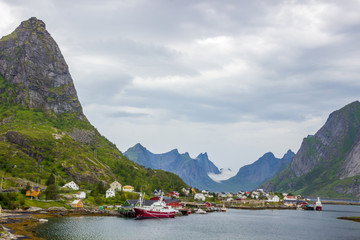 Fototapeta na wymiar fishing port and the mountains in Reine in Lofoten in Norway