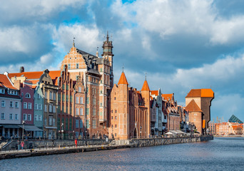 Obraz premium Waterfront promenade in Gdansk alongside Motlawa River, old town, very popular tourist location.