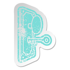 distressed old sticker of a door handle