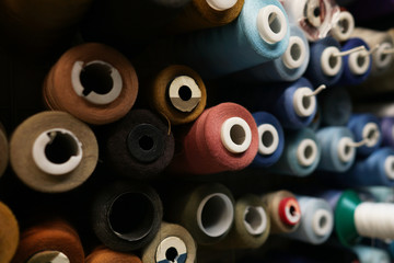 Colorful thread spools used in fabric and textile industry