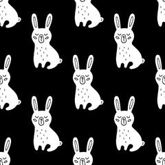 Cute cartoon rabbit background with hand drawn rabbits. Sweet vector black and white rabbit background. Seamless monochrome doodle rabbit background for textile, wallpapers, wrapping and cards. 
