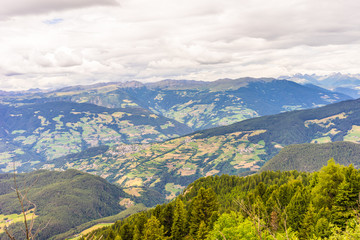 Alpe di Siusi, Seiser Alm with Sassolungo Langkofel Dolomite, a view of a large mountain in the background