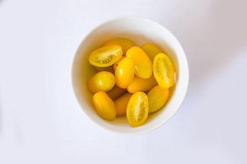 Exotic tomatoes rosa yellow tomatoes on a white background