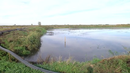 hydro-mechanical method of sapropel production. Pipeline for delivery of sapropel in the form of pulp to the shore to the place of dehydration and storage. Place alluvium sapropel in open warehouses.