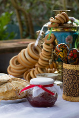 Shrovetide, pancake week.Russian style.Celebration.Tea party at the samovar with bagels, pancakes, jam in the yard.