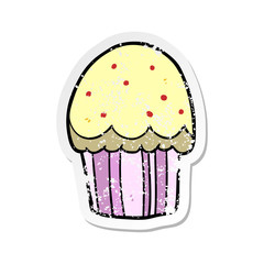 distressed sticker of a cartoon cupcake