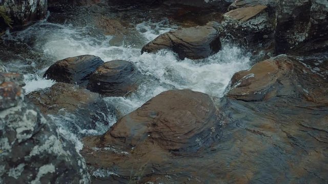 A slow motion shot of flowing river at Mac Mac pools.