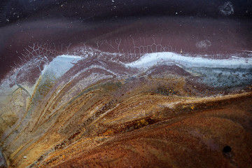 Obraz premium corrosion landscape on a burned iron sheet 