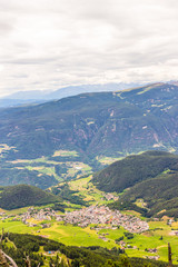 Alpe di Siusi, Seiser Alm with Sassolungo Langkofel Dolomite, a view of a large mountain in the background