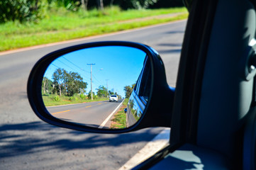 highway in the rearview mirror