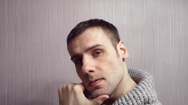 The face of one smart man. Portrait of an adult man thinking