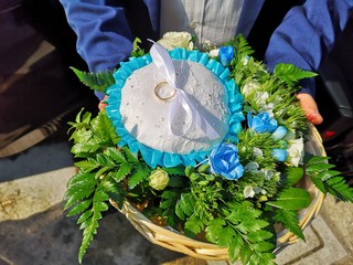 child with wedding basket