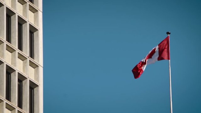 Beautiful Canadian glag blowing in the breeze downtown.