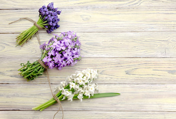 Three of the bouquet on the wooden background