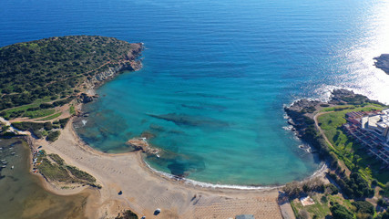Aerial drone photo of famous small islet with picturesque chapel of Agios Nikolaos and small marina, Anavissos area, Attica, Greece