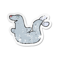 retro distressed sticker of a cartoon seal