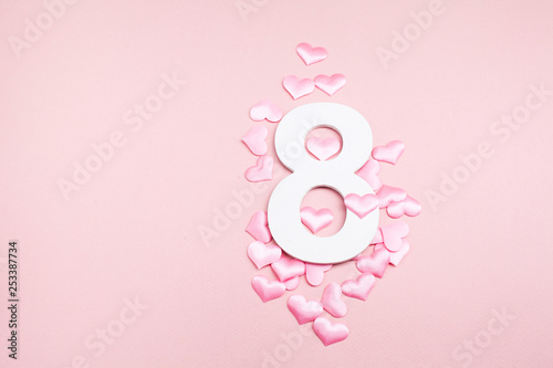 Happy womens day poster with number eight and hearts for greeting card, invitation