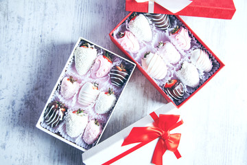 chocolate strawberries on box on desk