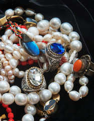 Pearl necklaces and rings with glasses  from India  ("treasures")