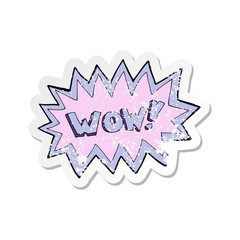 retro distressed sticker of a cartoon wow explosion