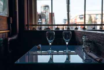 Empty glasses set in the interior of the restaurant