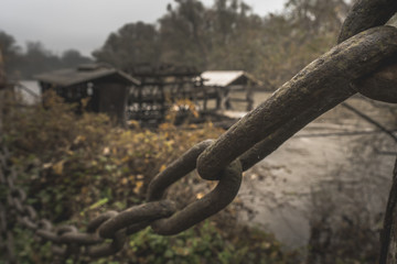 Old cnains and the mill on the river