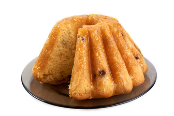 Rum Baba with a cup of tea on a white background