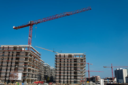 Construction site of an apartment building with crane