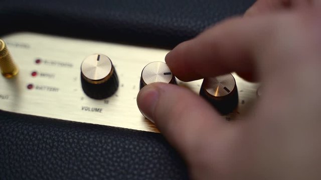 B-roll of a Marshall guitar amplifier, bluetooth sound box .