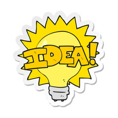 sticker of a cartoon idea light bulb symbol