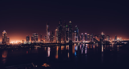 Fototapeta na wymiar Dubai marina by night from Jumeirah palm