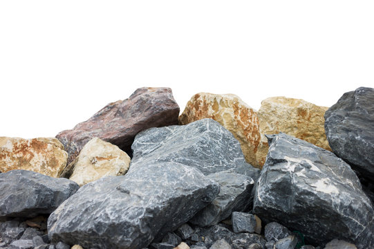 A pile of large natural granite stones isolated on a white background.