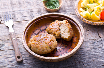 Homemade minced meat on wood.