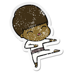 distressed sticker of a happy cartoon boy