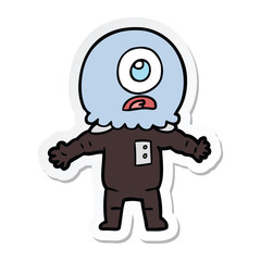 sticker of a cartoon cyclops alien spaceman
