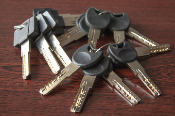 Keys on a dark wooden background.