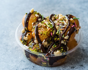 Turkish Dessert Lokma with Chocolate Sauce / Round Fried Dough Balls Petulla.