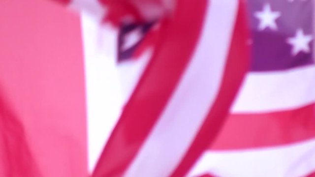 A Canadian Flag flying alongside an American Flag