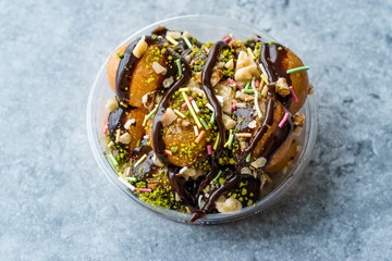 Turkish Dessert Lokma with Chocolate Sauce / Round Fried Dough Balls Petulla.