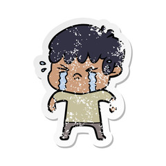 distressed sticker of a cartoon boy crying