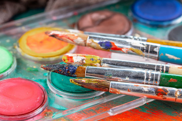 Fototapeta premium Paint brushes and paints for drawing.