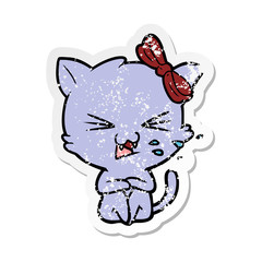 distressed sticker of a cartoon cat
