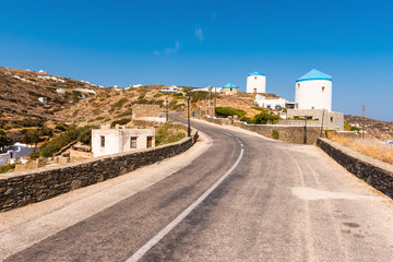 Traditional Greek windmills on the way to the village of Kastro on the island of Sifnos in Greece.