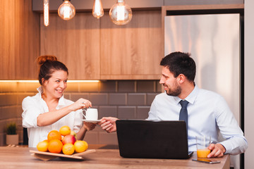 Morning routine of a young married couple