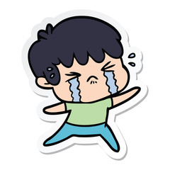 sticker of a cartoon boy crying
